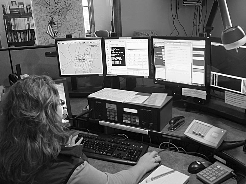 Below, Teresa Grenier demonstrates how the Emergency Medical Dispatch protocol software operates. She said she hopes new protocol software for fire and law-related emergencies will “speak” with the Computer Aided Dispatch software used by Lincoln County Communications that automatically records information that's typed in. JOHN MAGUIRE/Wiscasset Newspaper Below, Teresa Grenier demonstrates how the Emergency Medical Dispatch protocol software operates. She said she hopes new protocol software for fire and law-related emergencies will “speak” with the Computer Aided Dispatch software used by Lincoln County Communications that automatically records information that's typed in. JOHN MAGUIRE/Wiscasset Newspaper