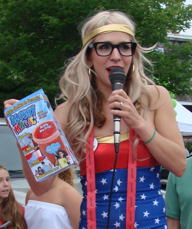 Waffle Girl Anya Arsenault shares information about one of the contest prizes – a slushy maker. LISA KRISTOFF/Boothbay Register Waffle Girl Anya Arsenault shares information about one of the contest prizes – a slushy maker. LISA KRISTOFF/Boothbay Register