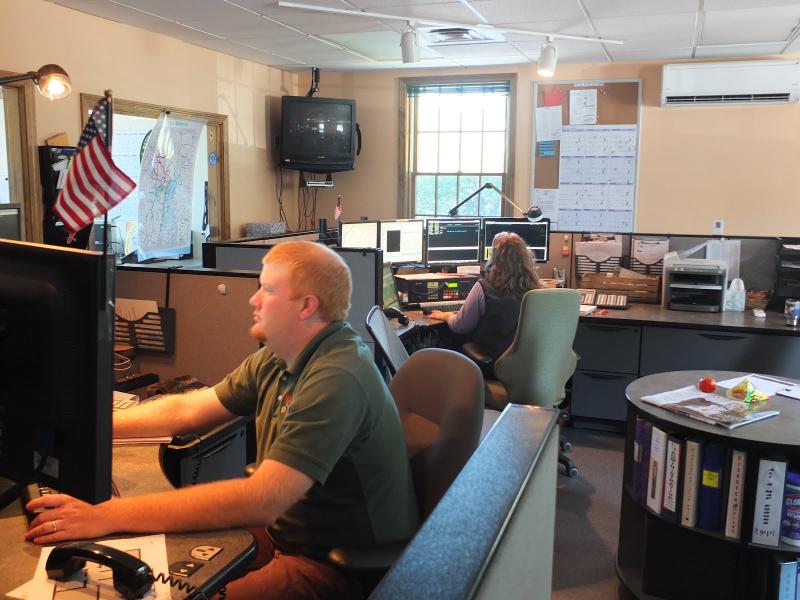 The Lincoln County Emergency Management Agency has offered to be the first in Maine to try following a new set of dispatch protocols for fire and law related emergencies. Below, Teresa Grenier demonstrates how the Emergency Medical Dispatch protocol software operates. She said she hopes new protocol software for fire and law-related emergencies will “speak” with the Computer Aided Dispatch software used by Lincoln County Communications that automatically records information that's typed in. JOHN MAGUIRE/Wiscasset Newspaper Emergency dispatch officers at Lincoln County Communications follow an established set of questions, 911 Emergency Medical Dispatch protocols, for each emergency that arises, from calls about heart attacks to construction accidents. Operators may also soon see a new set of protocols for fire and law related emergencies and Lincoln County EMA has offered to be the first in Maine to try them out. JOHN MAGUIRE/Wiscasset Newspaper