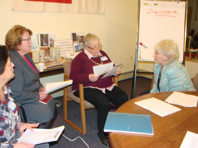 From left, Wiscasset Selectman Pam Dunning, Town Manager Laurie Smith, and DebraElizabeths’ owner Deb Schaffer meet with Roxanne Eflin from the Maine Development Foundation. Brainstorming in small groups was part of a November 12 meeting about the foundation’s Maine Downtown Network program. SUSAN JOHNS/Wiscasset Newspaper