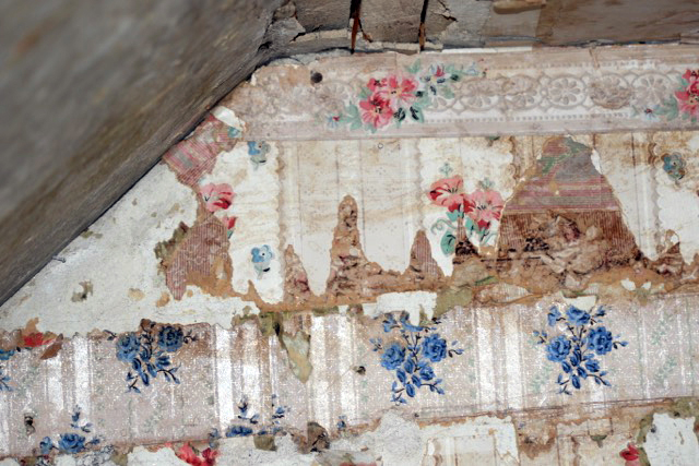 Layer upon layer of old wallpaper have been removed from walls in the Tiny House, and will be replaced with period wallpaper. Courtesy of Pamela Logan