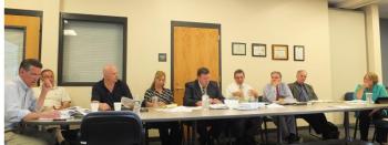 The Board met in Wiscasset July 10 for an all-day workshop at Two Bridges Regional Jail. Left to right, Executive Director Michael Tausek, Aroostock County Commissioner Douglas Beaulieu, Edgecomb Selectman Stuart Smith, Department of Corrections Executive Assistant Jane Tower, Spring Harbor Hospital Chief Operating Officer Ric Hanley, York County Commissioner David Bowles, Department of Corrections Commissioner Joseph Ponte and Department of Profession and Financial Regulation Commissioner Ann Head. CHARLOTTE BOYNTON/ Wiscasset Newspaper