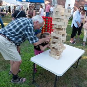 LCHA volunteer Dan Watts assists a youngster with a Jenga tower at last year's Jailhouse Rock event. Courtesy of LCHA LCHA volunteer Dan Watts assists a youngster with a Jenga tower at last year's Jailhouse Rock event. Courtesy of LCHA