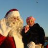 Santa waving with Natalie Dunbar in Wiscasset