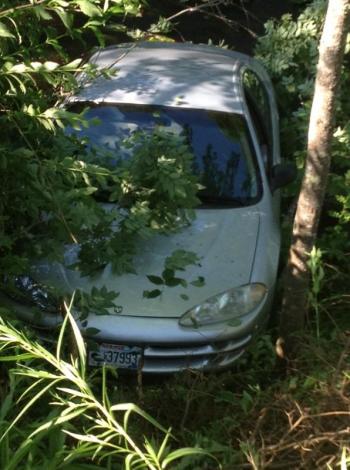 Marjory Whitehurst's car, partially in the Sheepscot River on Head Tide Road in Alna July 5. SUSAN JOHNS/Wiscasset Newspaper