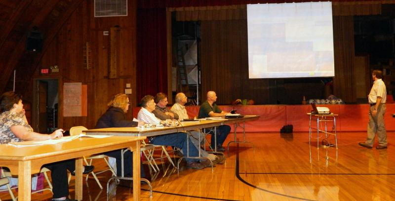 Edgecomb and Wiscasset Selectmen discuss MDOT plans to improve the safety of pedestrians and traffic from the Woolwich/Wiscasset town line to the Edgecomb/Newcastle town line. Left to right, Wiscasset Selectman Pam Dunning, Town Manager Laurie Smith, Wiscasset Selectmen William Curtis, Jefferson Slack, Edgecomb Selectman Stuart Smith, MDOT Representative Gerry Audibert. Below, Wiscasset Transportation Chairman Donald Jones listens attentively to MDOT Gerry Audibert explain the actions MDOT will support that were suggested at the June 4 Road Safety Audit of U.S. Route 1 in Wiscasset. CHARLOTTE BOYNTON/Wiscasset Newspaper Edgecomb and Wiscasset Selectmen discuss MDOT plans to improve the safety of pedestrians and traffic from the Woolwich/Wiscasset town line to the Edgecomb/Newcastle town line. Left to right, Wiscasset Selectman Pam Dunning, Town Manager Laurie Smith, Wiscasset Selectmen William Curtis, Jefferson Slack, Edgecomb Selectman Stuart Smith, MDOT Representative Gerry Audibert. CHARLOTTE BOYNTON/Wiscasset Newspaper