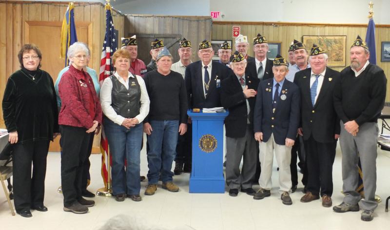Front, left to right: Mary Fish (Unit 42 President), Mary Jane McLoon (ALA Dept. ME President), Kaye Bouchard (Legion Riders Exec. Director), James Herald (Cdr. SAL Squad. 42), Area 3 Rep. Dan Boland, PNVC Wm. “Chick” Ciciotte, Jerry Elwell (Distr. 7 Sgt. at Arms), Paul Herald (Distr. 7 Cdr.), William J. Cossette Jr. (Post 54 Service Officer/2nd Vice Cdr.). Below: Chic Ciciotte of Topsham speaks passionately to fellow American Legionaires about the need to increase membership. JOHN MAGUIRE/Wiscasset Newspaper. Front, left to right: Mary Fish (Unit 42 President), Mary Jane McLoon (ALA Dept. ME President), Kaye Bouchard (Legion Riders Exec. Director), James Herald (Cdr. SAL Squad. 42), Area 3 Rep. Dan Boland, PNVC Wm. “Chick” Ciciotte, Jerry Elwell (Distr. 7 Sgt. at Arms), Paul Herald (Distr. 7 Cdr.), William J. Cossette Jr. (Post 54 Service Officer/2nd Vice Cdr.).