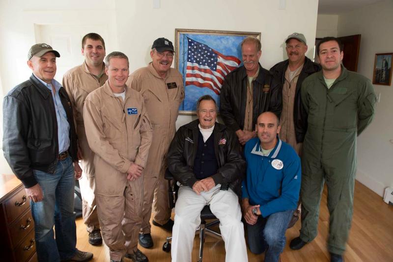 Murphy and fellow Warbirds pilots pose with honorary Warbirds pilot and 41st President George Herbert Walker Bush. Courtesy Texas Flying Legends Museum. Murphy and fellow Warbirds pilots pose with honorary Warbirds pilot and 41st President George Herbert Walker Bush. Courtesy Texas Flying Legends Museum.