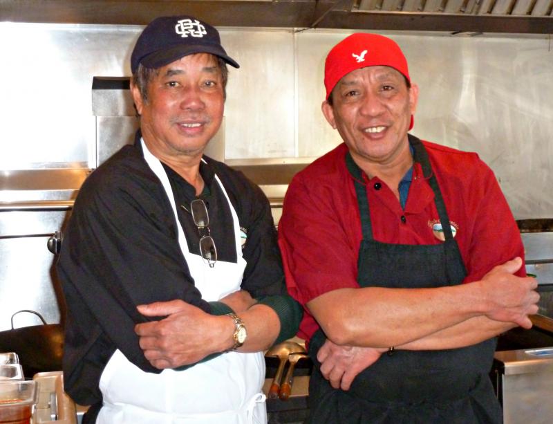 Owner Papito Juntura, left, and cook Orlando Mainit on duty at the Wok ‘n Grill. KATRINA CLARK/Boothbay Register