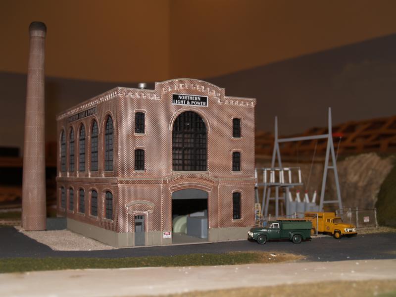 The immense model railroad display at the Boothbay Railway Village is so large it has its own building. So far this year, volunteers have added several new buildings, additional landscape and finished the wiring for several signs and buildings that now light up. Pictured is one of the newer structures on an unfinished scenery area. It is a 1950's era power plant with a lighted and detailed interior. Courtesy of Margaret Hoffman The immense model railroad display at the Boothbay Railway Village is so large it has its own building. So far this year, volunteers have added several new buildings, additional landscape and finished the wiring for several signs and buildings that now light up. Pictured is one of the newer structures on an unfinished scenery area. It is a 1950's era power plant with a lighted and detailed interior.