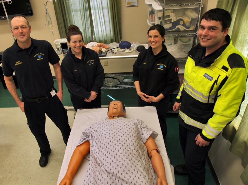 Standing in the Boothbay Region Ambulance Service simulation lab are, from left, Operations Manager and Paramedic Scott Lash, Paramedic Katie Hudson, Advanced Emergency Medical Technician Kerri Dupre and Emergency Medical Technician James Bodman. These Boothbay Region Ambulance Service members have pulled together to better practice their skills. Courtesy of LincolnHealth