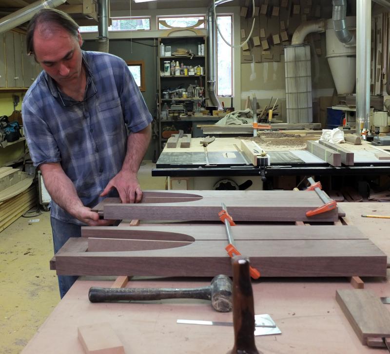 Eben Blaney fitting tenons on one of his commissioned "Cormorant tables" at his shop in Edgecomb. The artist/craftsman of fine furniture, has been selected as an exhibitor in the 38th Annual Philadelphia Museum of Art Craft Show in early November. The Cormorant is one of the five Blaney pieces bound for Philly later this year. LISA KRISTOFF/Boothbay Register Eben Blaney, Edgecomb ME