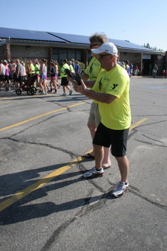 Race timers Bill Logan, left, and Mark Gimbel get ready for the start. KEVIN BURNHAM/Boothbay Register