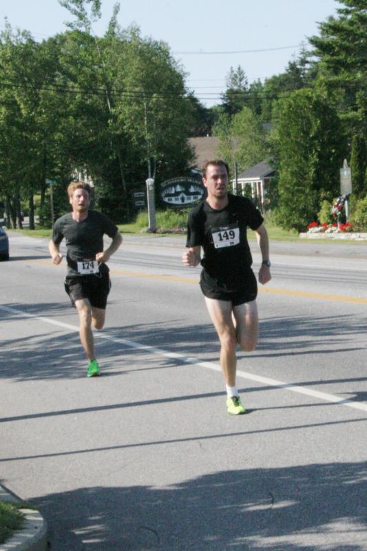 Maclean O’Donnell, right, and Pat Jackson, finish first and second in the Rocky Coast 5k. KEVIN BURNHAM/Boothbay Register