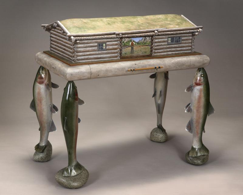 This storage box for fly fishing gear by Bath-based woodworker Tom Dahlke is based on the National Park Service's Cunningham Cabin in Jackson Hole, Wyo. Dahlke will be showing his amazing custom furniture at the show July 19 and 20. Woodworker Tom Dahlke