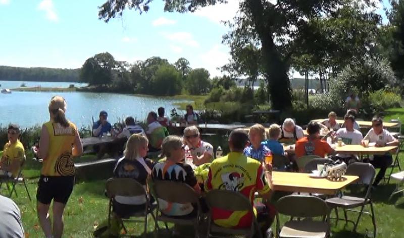 BikeMaine riders enjoy their lunch next to the Damariscotta River. Courtesy of Mal Gormley