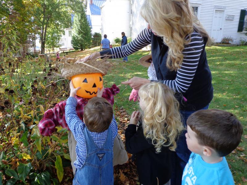 Shawna and Devon Roy get help from Graham Burke putting the final touches on our friendly scarecrow. Courtesy of Natalie Castonia