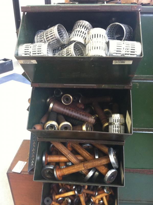 Mainstays at the new Newcastle shop, Milling Around, wooden bobbins and dye tubes. SUZI THAYER/Wiscasset Newspaper