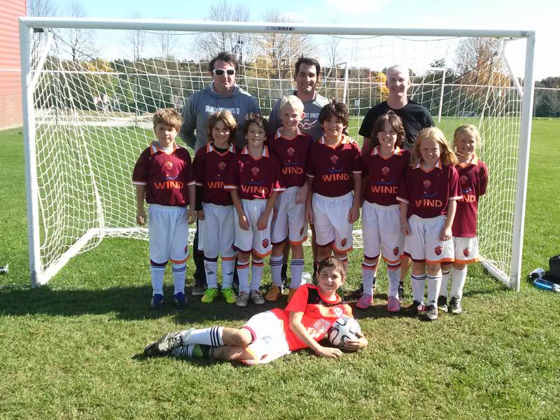 Midcoast United Soccer Club's U10 team went 5-1 on their regular season play. Pictured are, from left, front row: Will Farrell; middle row: Mason Woodman, Isaac Thompson, Nick Archer, Connor McFarland, Maddox Tilas, Oliver Hunter, Skylar Houghton and Marley Label; back row: coaches Jason Hunter, Matt Tilas and Tom Farrell. Courtesy of Marcy Tilas