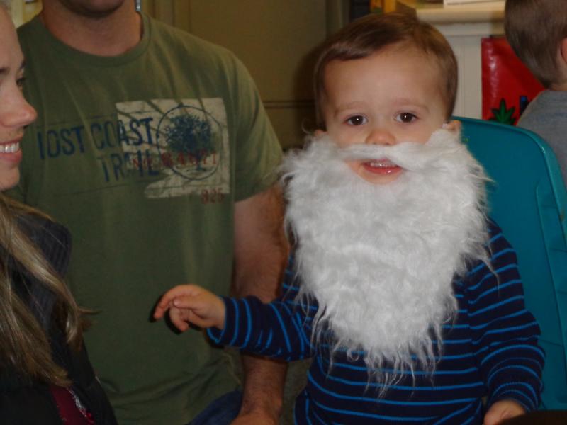 Masen Michaud dons a Santa beard for the Wiscasset Public Library’s sing-along. Courtesy of Natalie Castonia