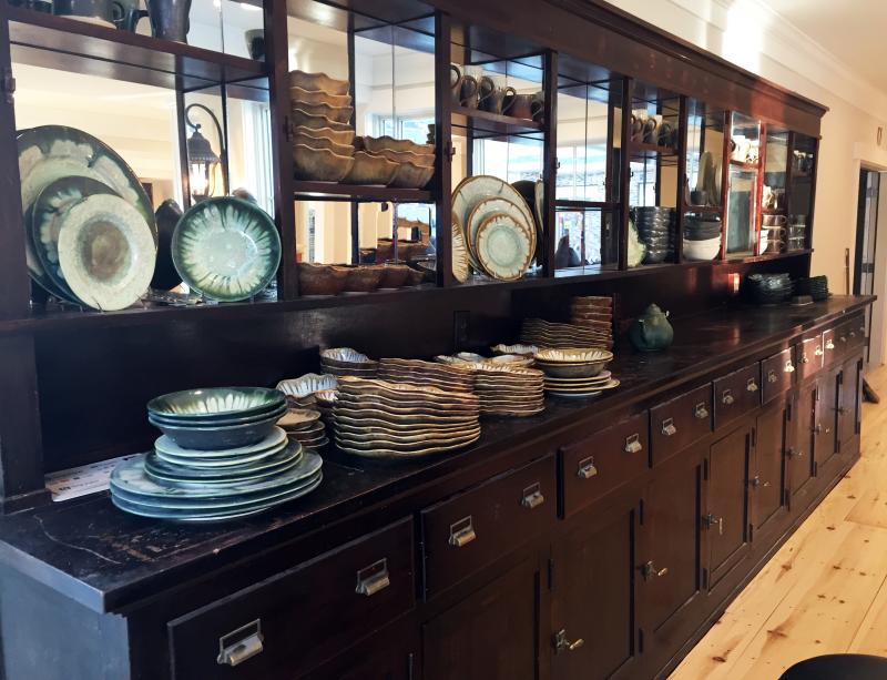This cabinet, and others like it, was in the building when Alison Evans and Chris Fritz bought it. It had been used in Wheeler’s Drug Store, and Mitchell’s Drug Store before that. SUZI THAYER/Boothbay Register