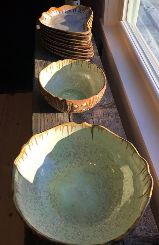 A display of some of Alison Evans’ pieces are in a window at the front of the showroom.