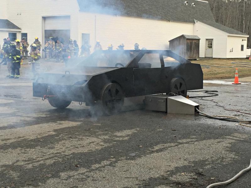 Smoking up the prop car before starting the fire. KATRINA CLARK/Boothbay Register