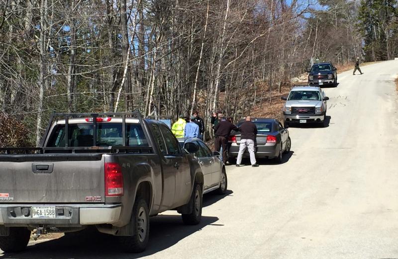 Law enforcement authorities and vehicles line Quarry Farm Road in Edgecomb outside the home of missing woman Lynne Crink on Sunday, April 19. SUZI THAYER/Boothbay Register