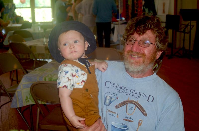 Easton Morgan and John Young give moral support. ART MAYERS/Wiscasset Newspaper