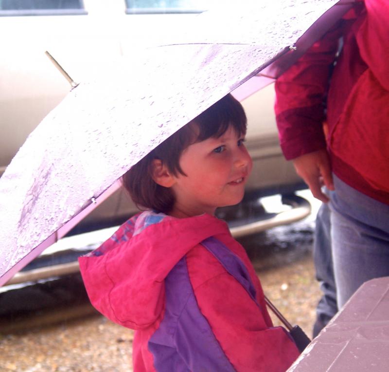 Ava Ward of Newcastle came prepared for the rain at Touch-a-Truck. ART MAYERS/Wiscasset Newspaper