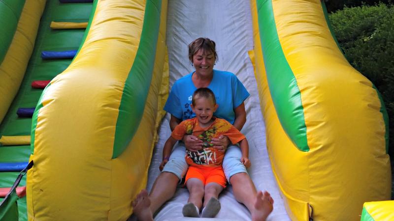 Kim Palino and her son Kaysen have a ball on the bouncy slide at the Family Fun Carnival on July 24. KATRINA CLARK/Boothbay Register