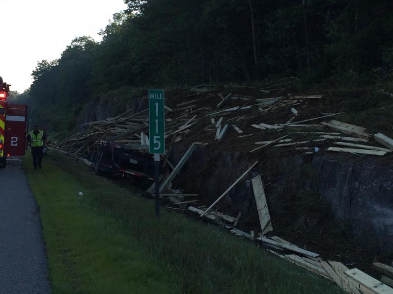 On July 29, lumber from a truck fell across I-95 in Sydney. (Photo courtesy Maine Office of Public Safety)