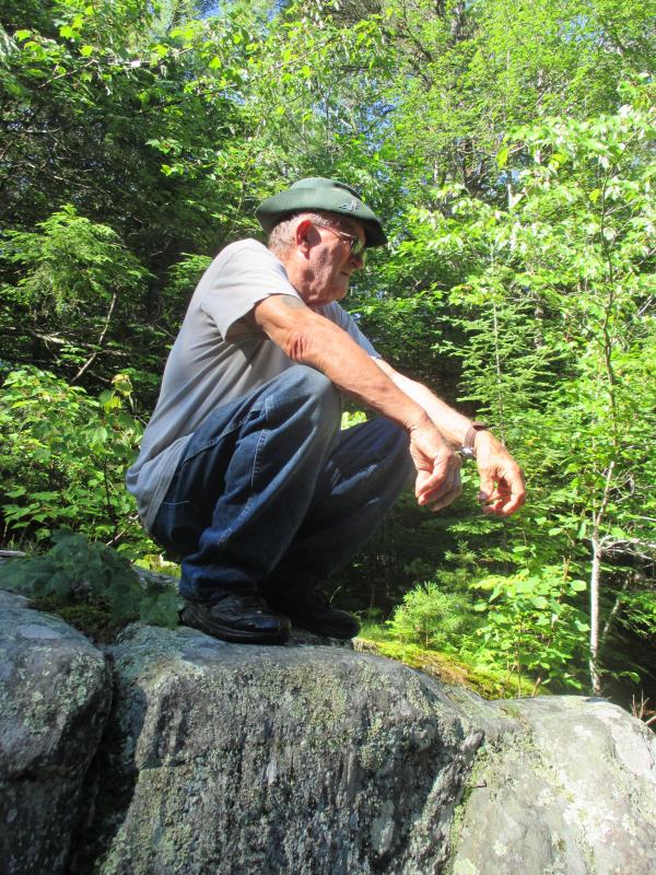 Blinn LeBourdais gazes down on Montsweag Brook off Gorham Road. In the 1940s, the road didn’t stop at the brook but continued across a small bridge and into Woolwich. PHIL DI VECE/Wiscasset Newspaper