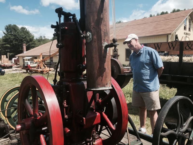 Train buff Chris Betz of Houston, Texas, looks over a century-old engine Sunday, Aug. 9 at the Wiscasset, Waterville & Farmington Railway Museum’s picnic weekend. Richard Verney of Alna owns the engine that was on display. SUSAN JOHNS/Wiscasset Newspaper Chris Betz