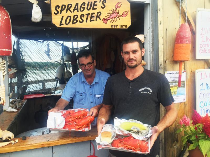 Frank Sprague and son Nate show off some of their lobster dinners at Sprague’s Lobster. SUZI THAYER/Wiscasset Newspaper