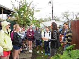 Current Executive Director Laura Paul greets new volunteers. Courtesy of Rick Prose