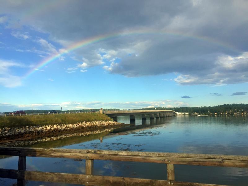 A rainbow appeared over the Donald E. Davey Bridge on Aug. 6, after a brief downpour. Frank Sprague said he has seen more rainbows this summer from the wharf where his business sits than he can count. SUZI THAYER/Wiscasset Newspaper
