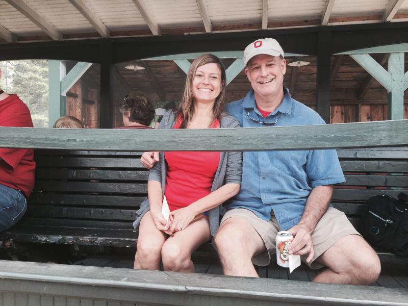Monica and Chris Betz of Houston, Texas, wait on an open train car for the start of a ride at Wiscasset, Waterville & Farmington Railway Museum in Alna on Aug. 9. The museum held a picnic throughout the weekend with steam train rides, a yard sale and other attractions. SUSAN JOHNS/Wiscasset Newspaper Monica Betz, Chris Betz, Wiscasset, Waterville & Farmington Railway Museum, Alna