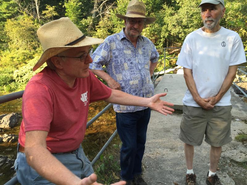 Head Tide Dam Committee member Gerry Flanagan speaks about the history of Alna’s Head Tide neighborhood. Looking on are fellow committee member Chris Murphy, center, and Alna resident Joe Barth. SUSAN JOHNS/Wiscasset Newspaper Gerry Flanagan, Chris Murphy, Joe Barth, Head Tide Dam