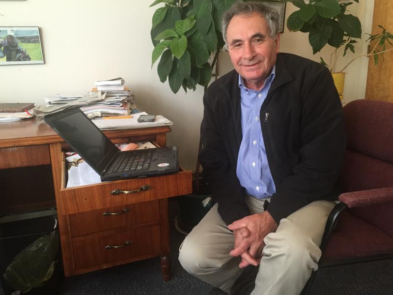 CEI’s founder and Chief Executive Officer Ron Phillips balances his laptop on a desk drawer Oct. 15 during the first of two moving days at CEI’s Water Street offices. SUSAN JOHNS/Wiscasset Newspaper Ron Phillips, CEI, Coastal Enterprises
