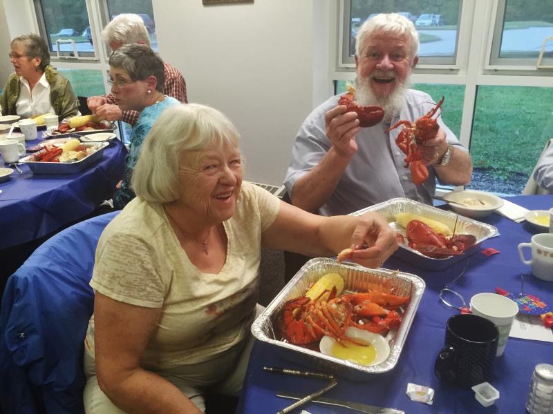 Cyndy Lewis, left, of Westport Island, and husband Newt Blakesley enjoy their lobster meals during Wiscasset Senior Center’s 25th anniversary celebration on Sept. 30. Westport Island lobsterman Mike Cromwell caught the lobsters, said Lewis, a senior center trustee. SUSAN JOHNS/Wiscasset Newspaper Cyndy Lewis, Newt Blakesley, Wiscasset Senior Center