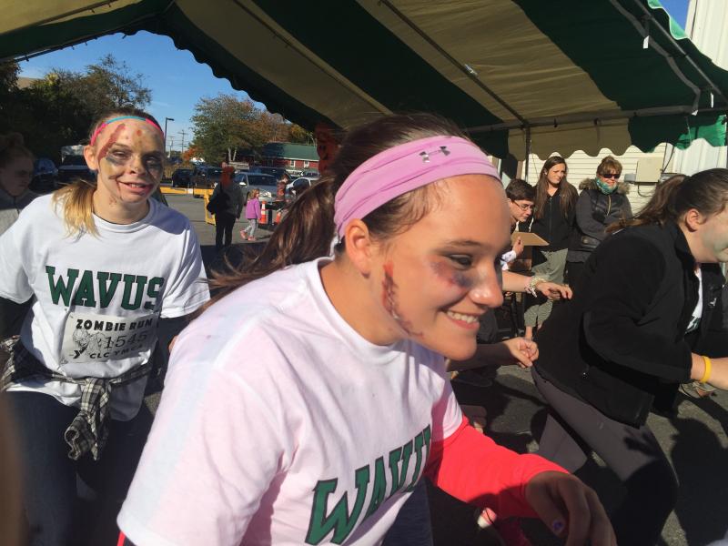 Entrants running as flag-seeking zombies take off from the start of CLC YMCA’s Zombie Run on Oct. 10. SUSAN JOHNS/Wiscasset Newspaper