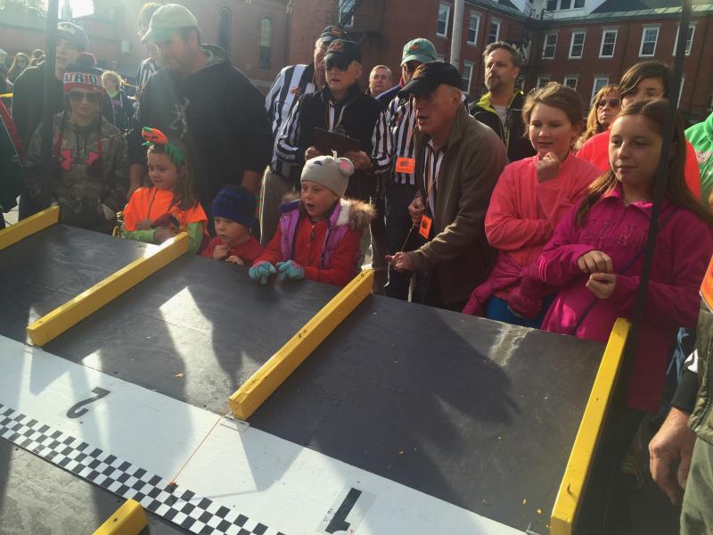 Some of the youngest entrants in the 2015 Pumpkin Derby at Damariscotta Pumpkinfest and Regatta on Oct. 11 react to their carts’ performance. SUSAN JOHNS/Wiscasset Newspaper
