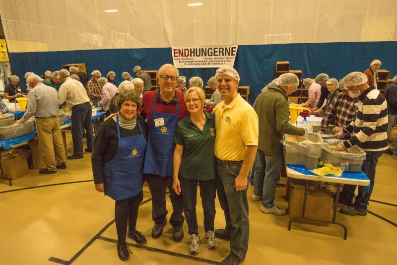 At Sunday's food packaging event: Helen Meserve (left) of the Boothbay Region Food Pantry and the Food For Thought program of the Boothbay Region Community Resources Council; Ham Meserve, president of Boothbay Harbor Rotary; Nancy Stolz, president of Damariscotta-Newcastle Rotary; and Matthew Martin, director of Outreach Inc. Courtesy of Steve Demeranville