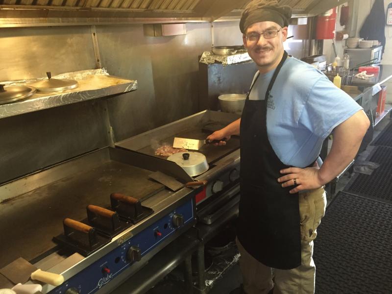 Miss Wiscasset Diner chef James Murray tends the grill. SUSAN JOHNS/Wiscasset Newspaper