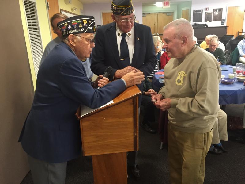 American Legion Area 3 (Lincoln, Sagadahoc and Knox counties) Commander Steve Jarrett, left, and American Legion Post 54 of Wiscasset Commander William Cossette Jr. meet with World War II veteran Wallace Roby of Wiscasset Nov. 11 at the Wiscasset Senior Center. SUSAN JOHNS/Wiscasset Newspaper