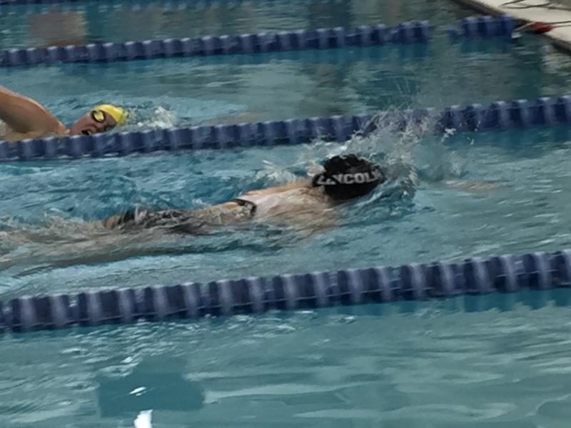 Seahawk Emma Pearce and Eagle Essie Martin both give it their all during the girls 200-yard freestyle, and both qualify for states. KATRINA CLARK/Boothbay Register