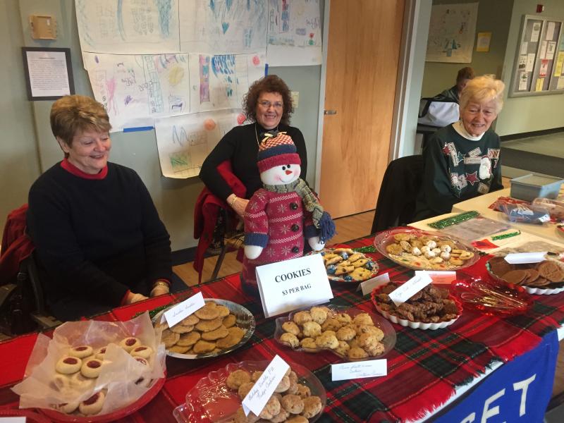 From left, Arlene Polewarczyk, Barbara Britton and Carolyn Young sell baked goods outside Saturday’s Breakfast with Santa event. SUSAN JOHNS/Wiscasset Newspaper