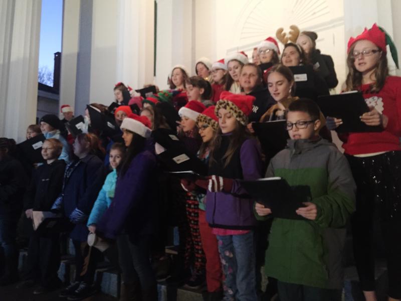Wiscasset schoolchildren entertain the crowd with holiday songs. SUSAN JOHNS/WIscasset Newspaper