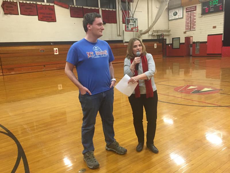 Wiscasset Middle High School technology coordinator and student council adviser Deb Pooler tells an assembly Dec. 21 about senior Avery Thomas’ holiday display on Bath Road. SUSAN JOHNS/Wiscasset Newspaper